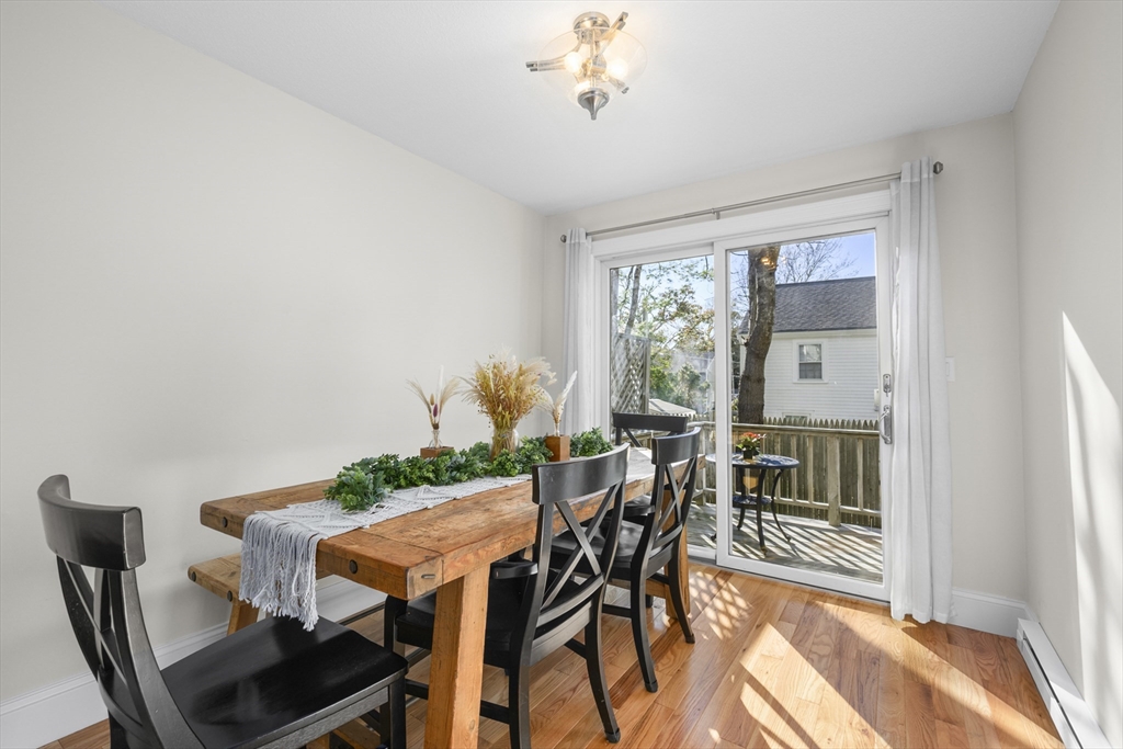 231 Route 28, Unit 20 Harwich, MA 02671 - Photo 5 of 22 a view of a dining room with furniture window and outside view