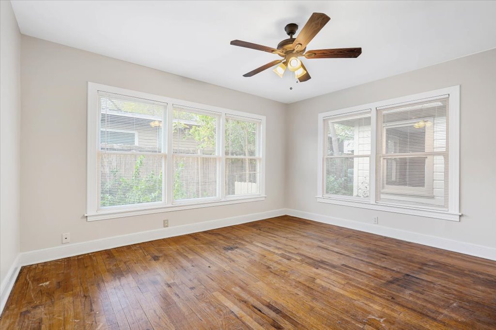 3510 Lafayette Avenue Austin, TX 78722 - Photo 13 of 15 a view of an empty room with wooden floor and a window