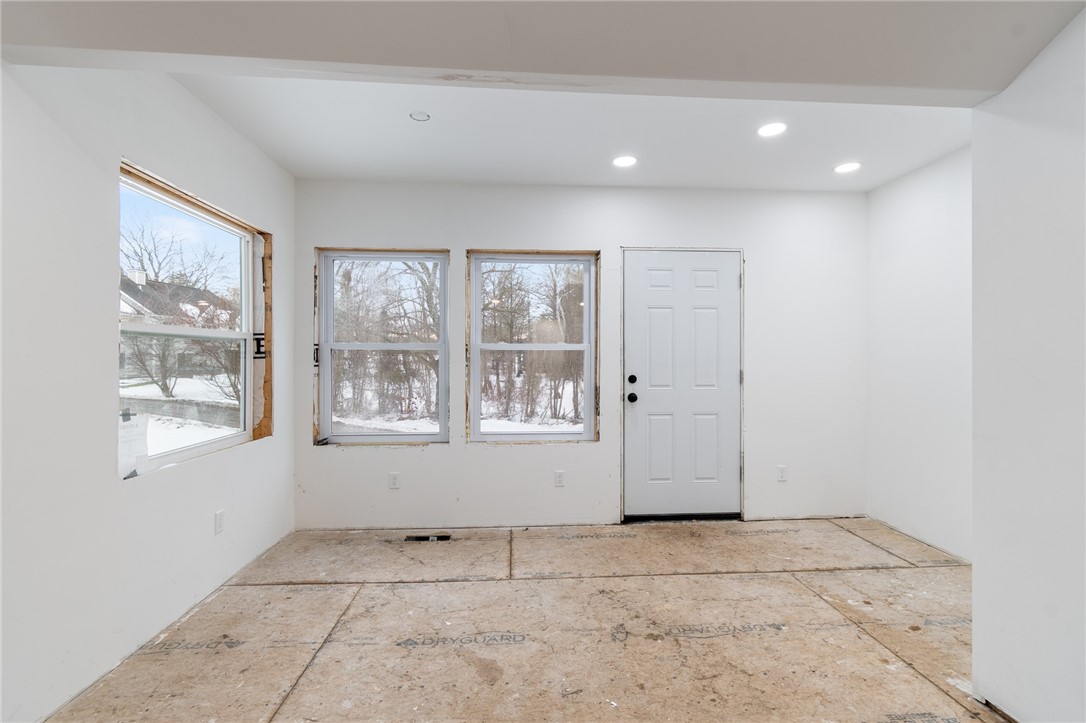 1993 Bailey Road Ontario, NY 14519 - Photo 16 of 37 The side door exit- used to be a porch