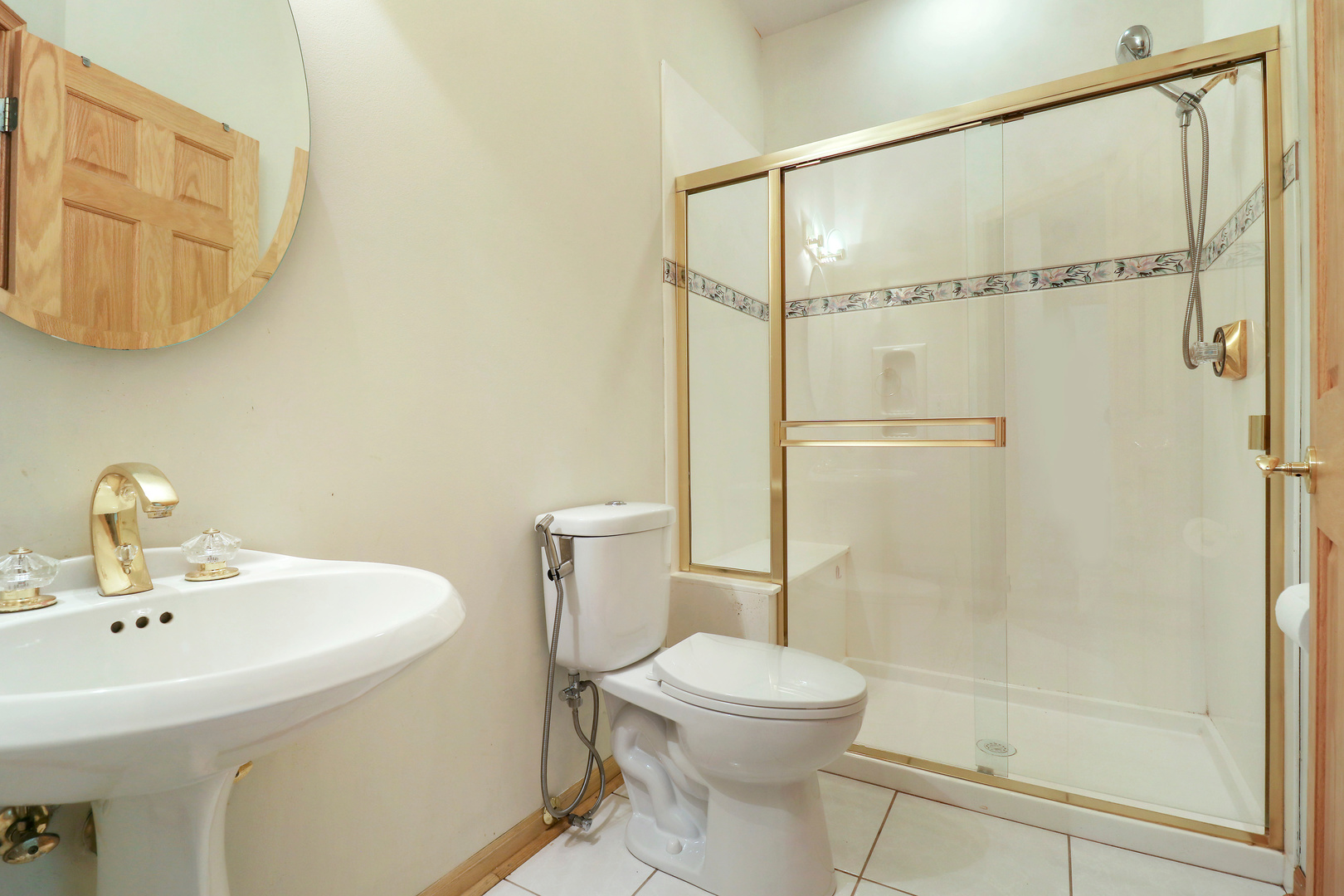 5551 Amanda Court Rolling Meadows, IL 60008 - Photo 15 of 27 a bathroom with a sink a toilet and shower