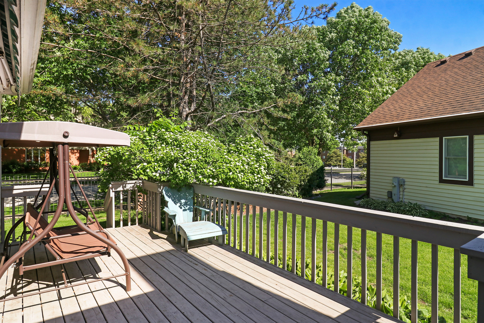 5551 Amanda Court Rolling Meadows, IL 60008 - Photo 22 of 27 a view of balcony with wooden floor and outdoor seating