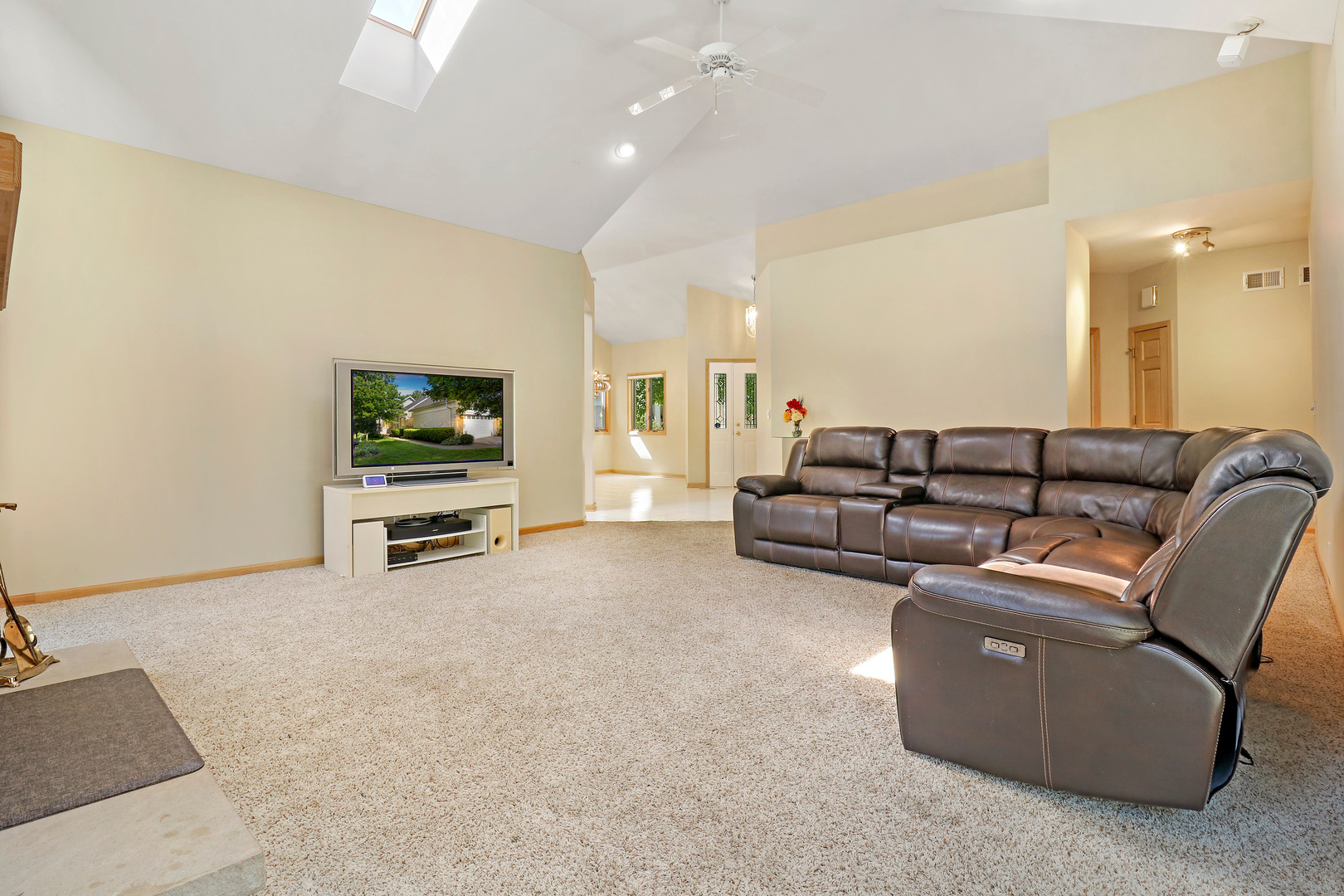 5551 Amanda Court Rolling Meadows, IL 60008 - Photo 5 of 27 a living room with furniture and a flat screen tv