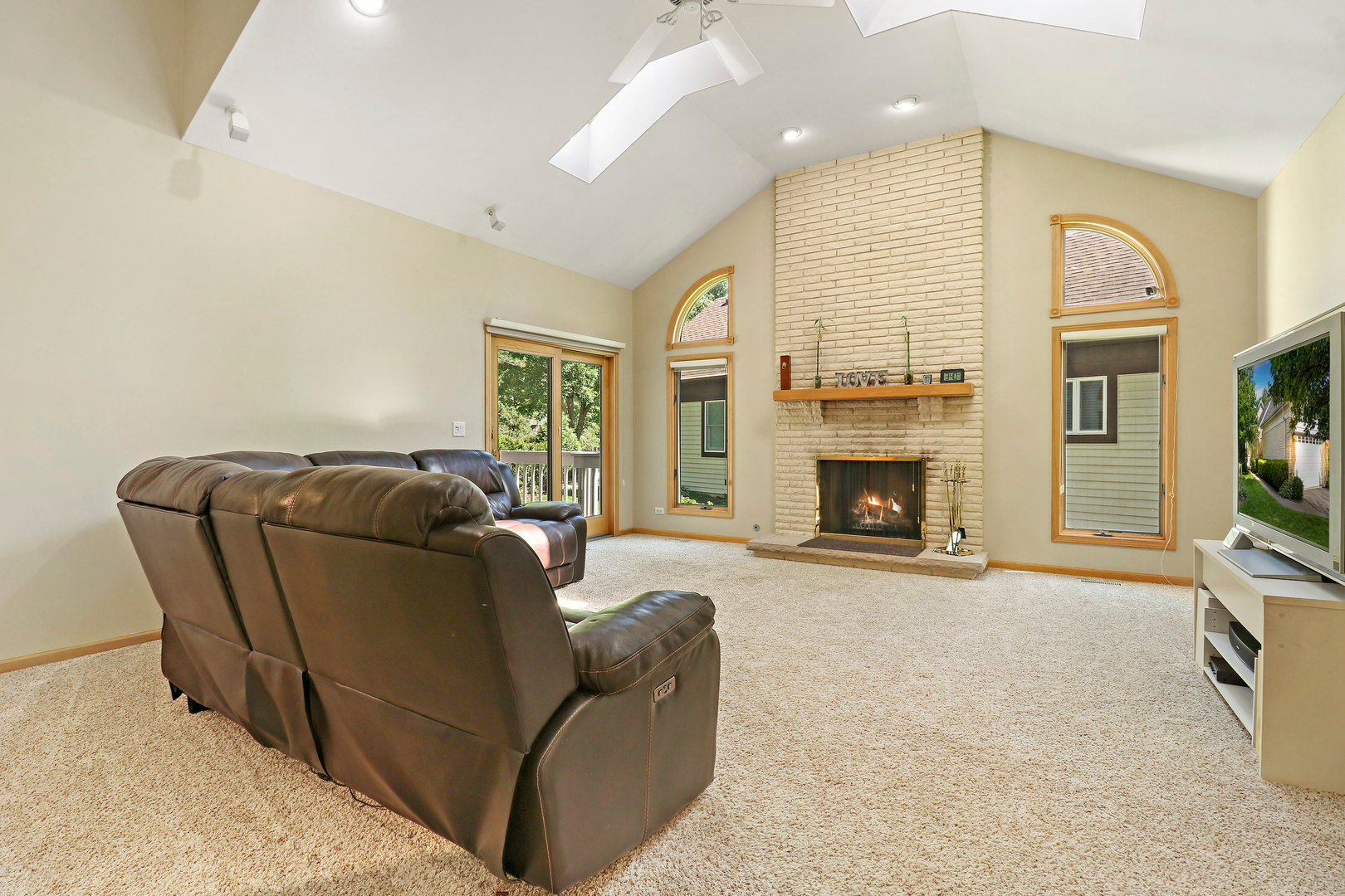 5551 Amanda Court Rolling Meadows, IL 60008 - Photo 6 of 27 a living room with furniture window and a fireplace