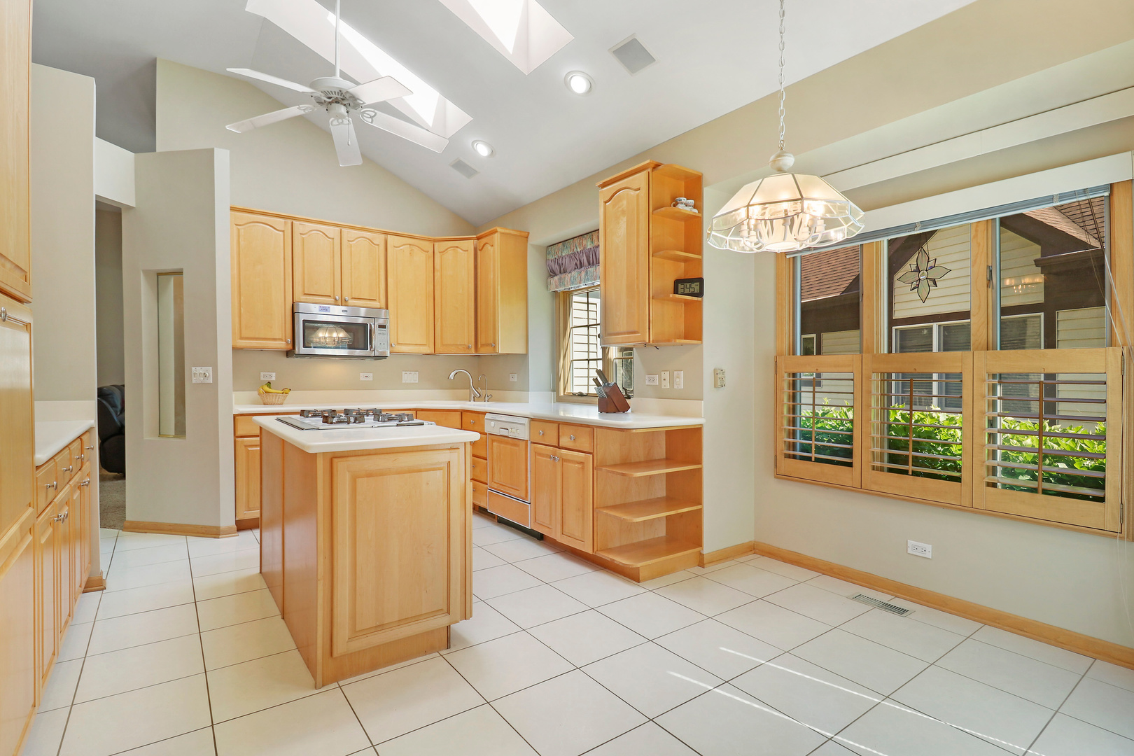 5551 Amanda Court Rolling Meadows, IL 60008 - Photo 9 of 27 a kitchen with stainless steel appliances granite countertop a refrigerator and a sink