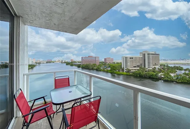 a balcony with an outdoor seating
