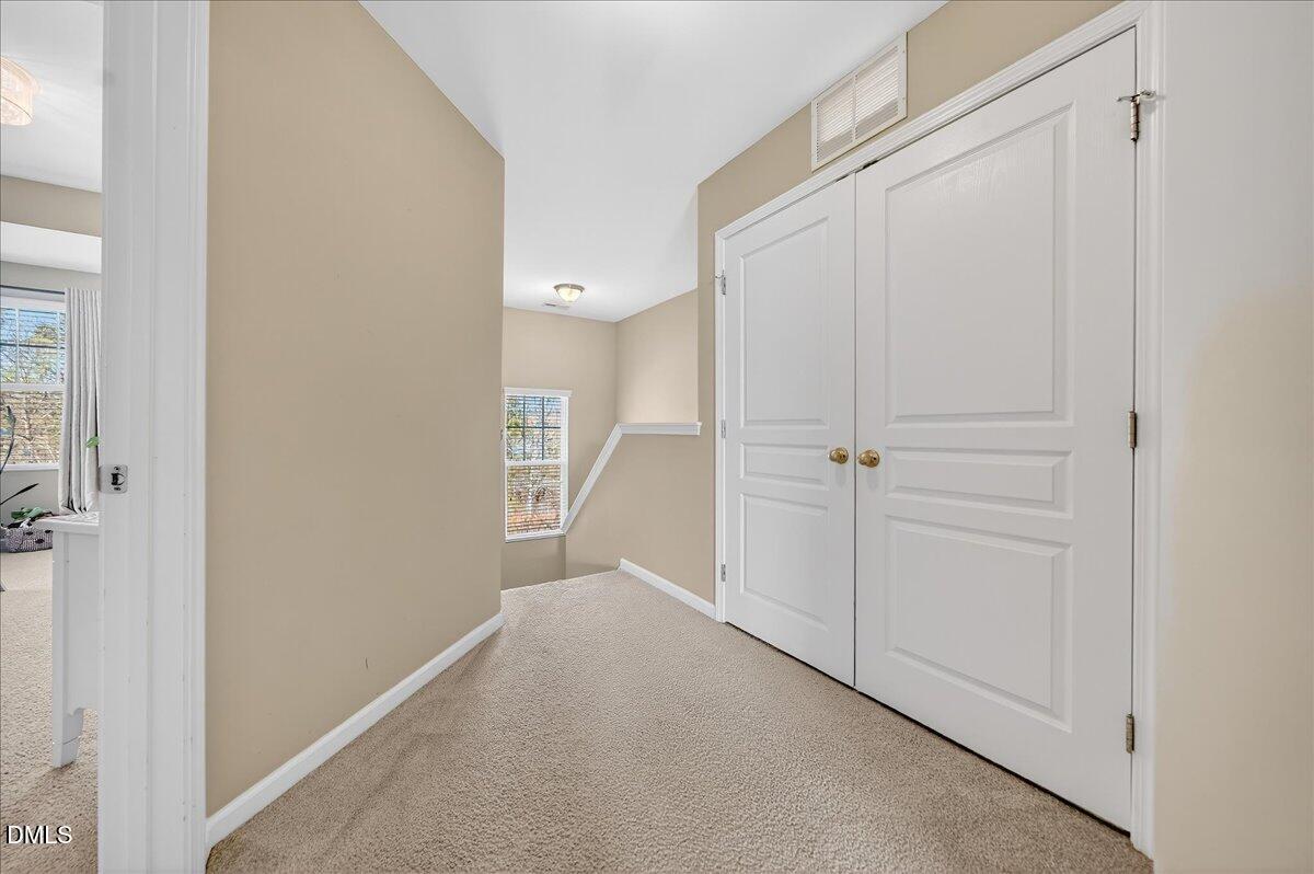 9328 Wooden Road Raleigh, NC 27617 - Photo 25 of 58 a view of an empty room