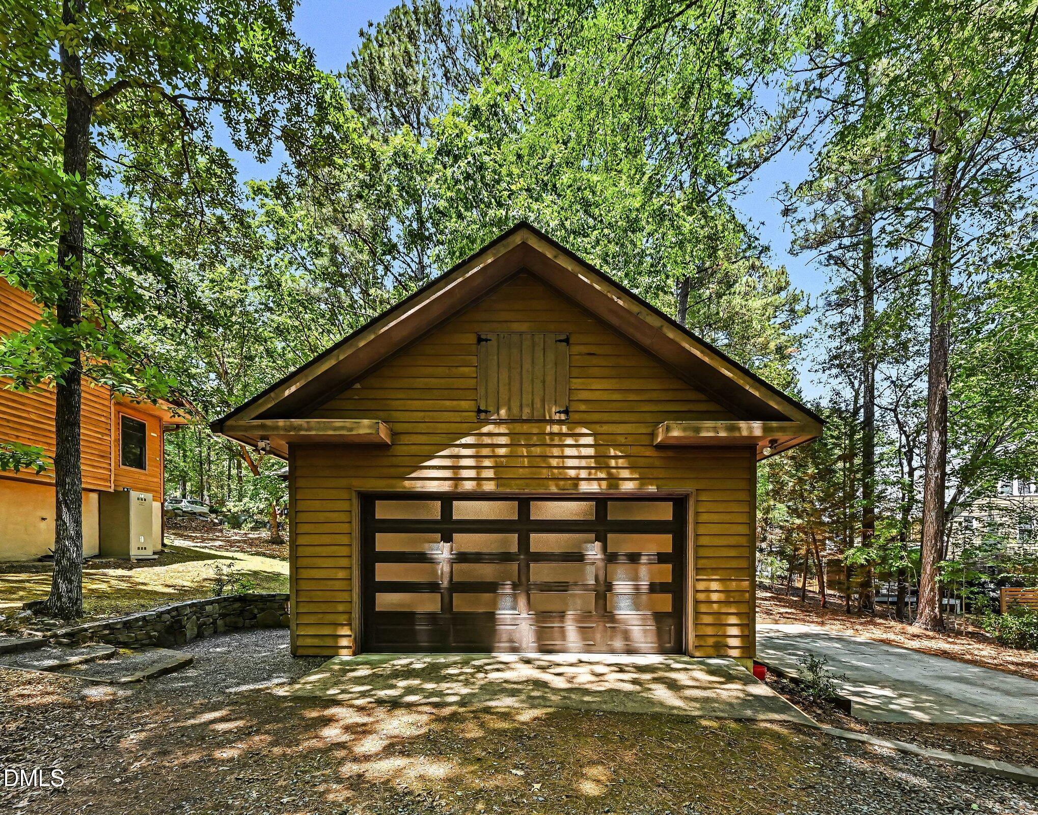 200 Spring Valley Road Carrboro, NC 27510 - Photo 25 of 38 a view of a house with a yard