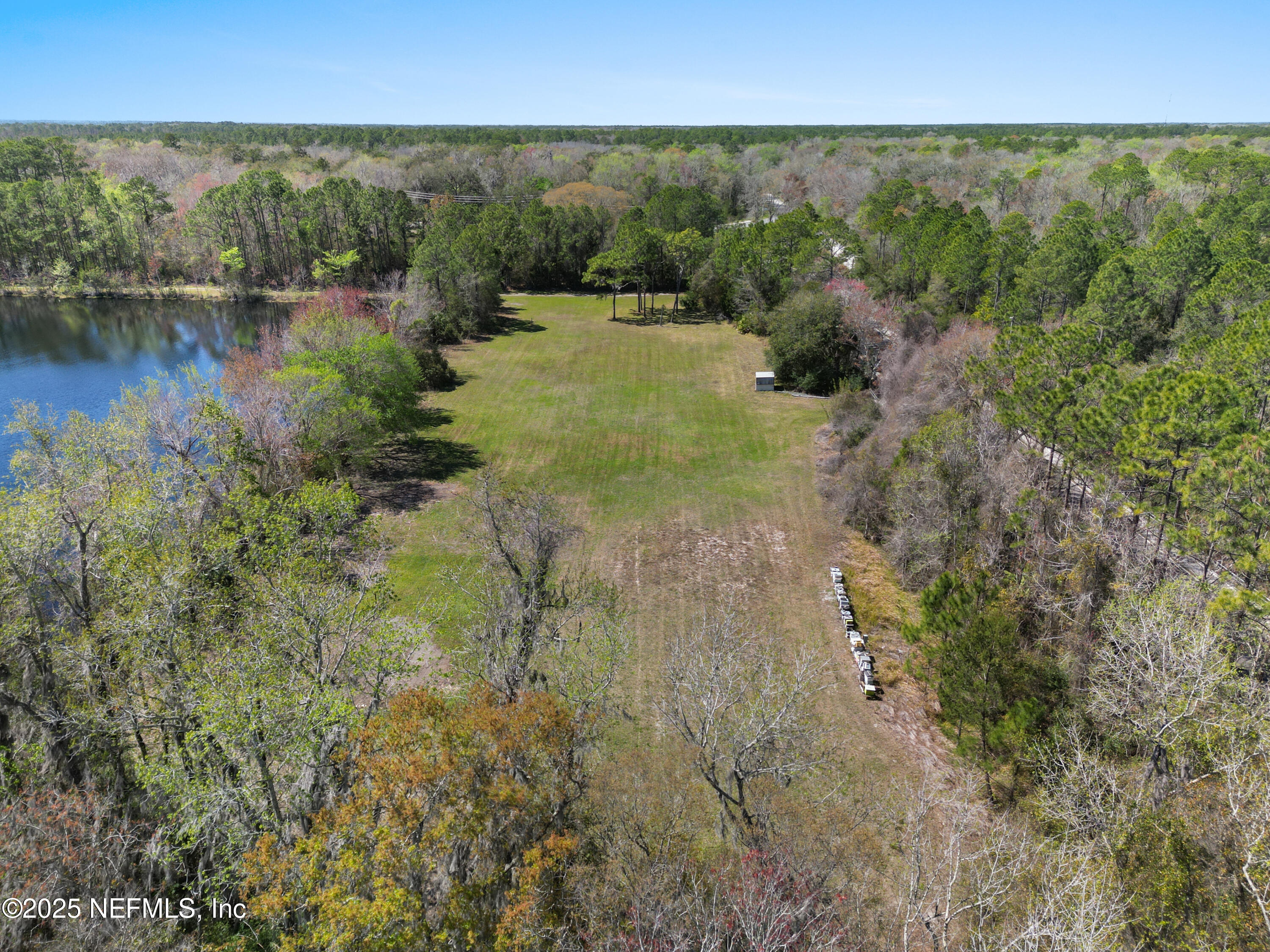 a view of lake with green space