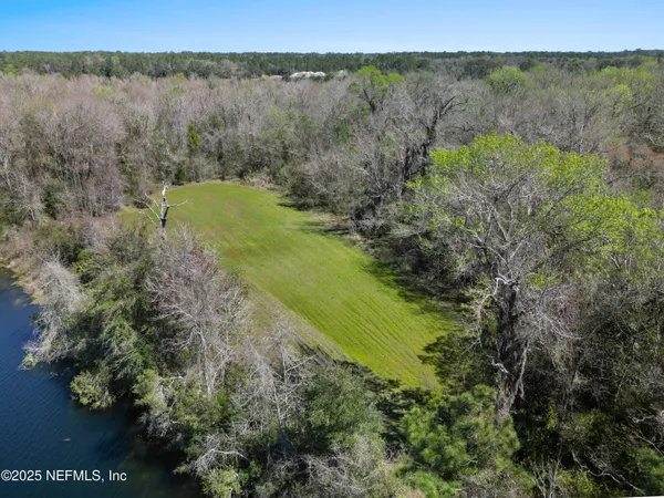 a view of a lake with a mountain in the background
