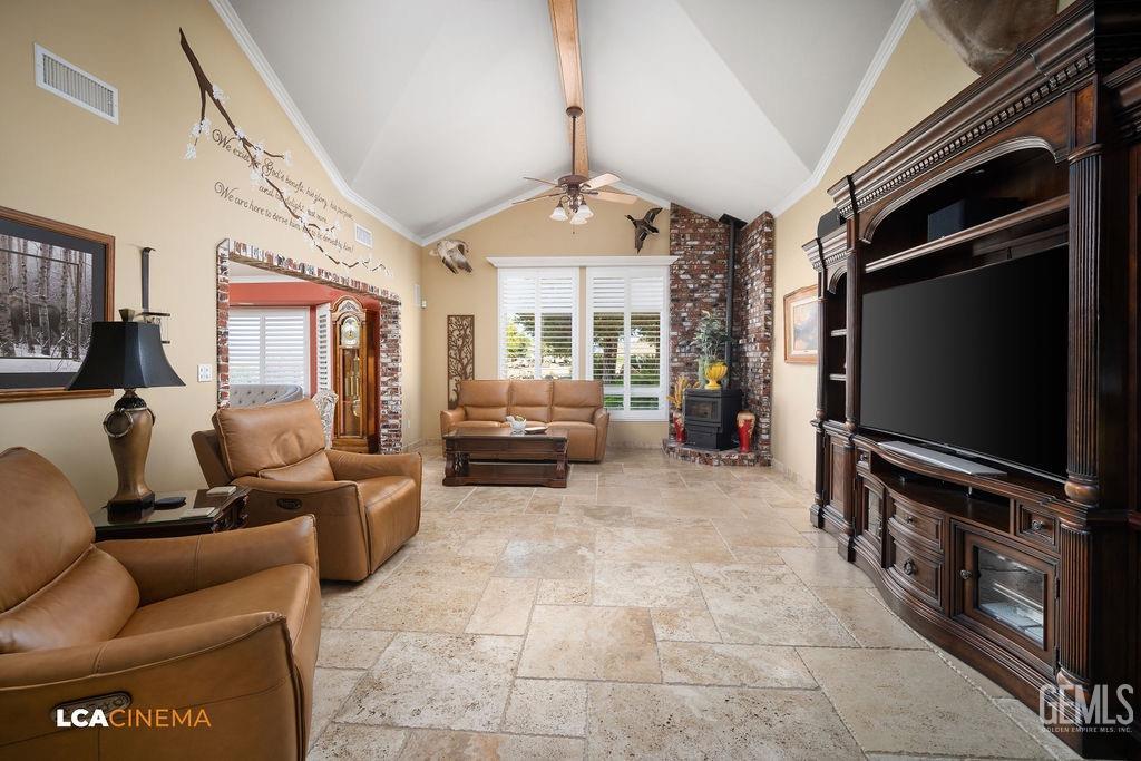 Undisclosed Address Shafter, CA 93263 - Photo 13 of 34 a living room with furniture a flat screen tv and a window