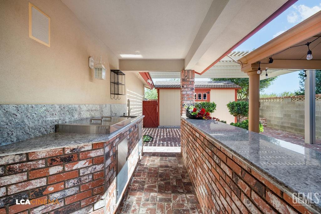 Undisclosed Address Shafter, CA 93263 - Photo 27 of 34 a view of a living room and bathroom
