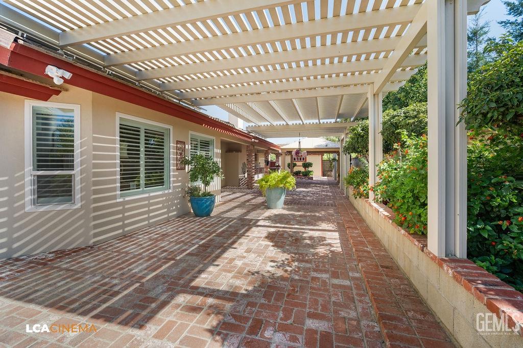 Undisclosed Address Shafter, CA 93263 - Photo 29 of 34 a view of a porch with wooden floor