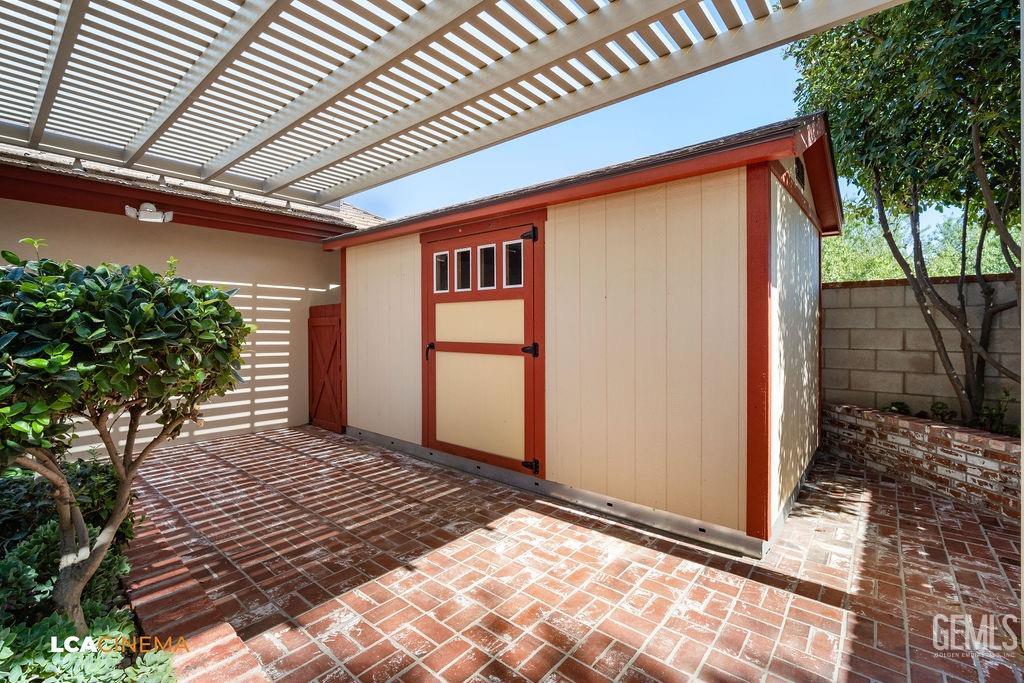 Undisclosed Address Shafter, CA 93263 - Photo 30 of 34 a view of backyard with a large tree