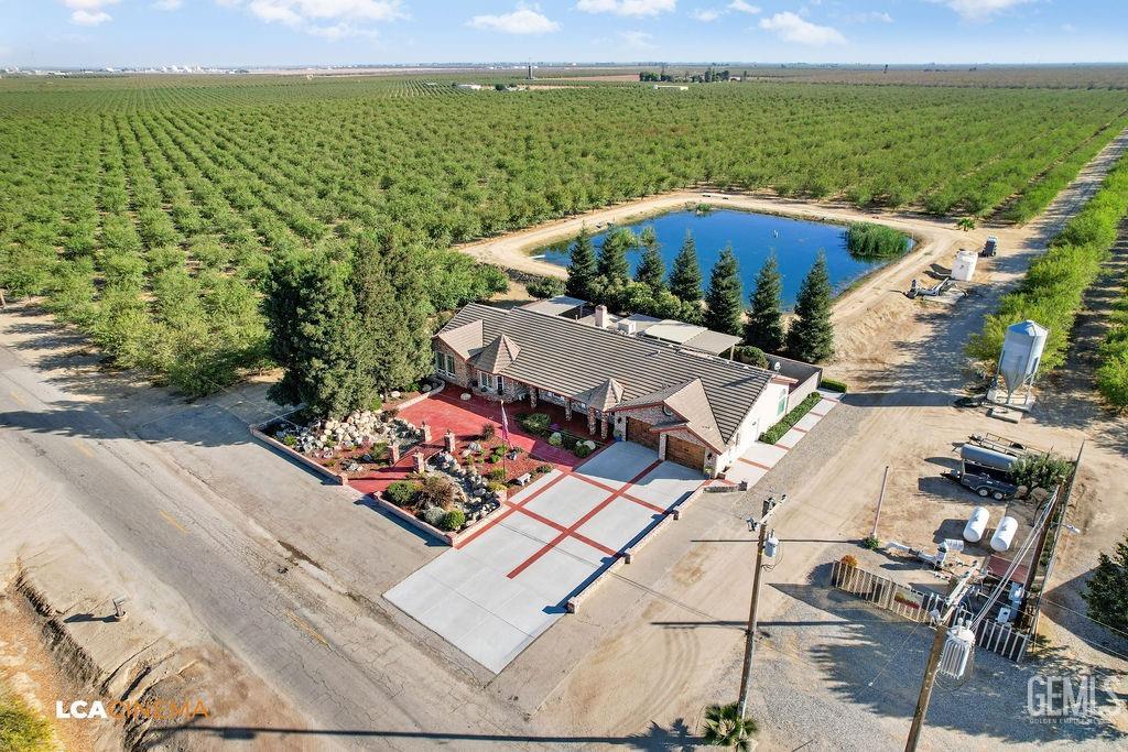 Undisclosed Address Shafter, CA 93263 - Photo 32 of 34 an aerial view of a house with a garden