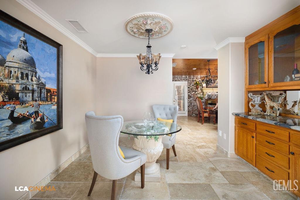 Undisclosed Address Shafter, CA 93263 - Photo 8 of 34 a dining room with furniture and window