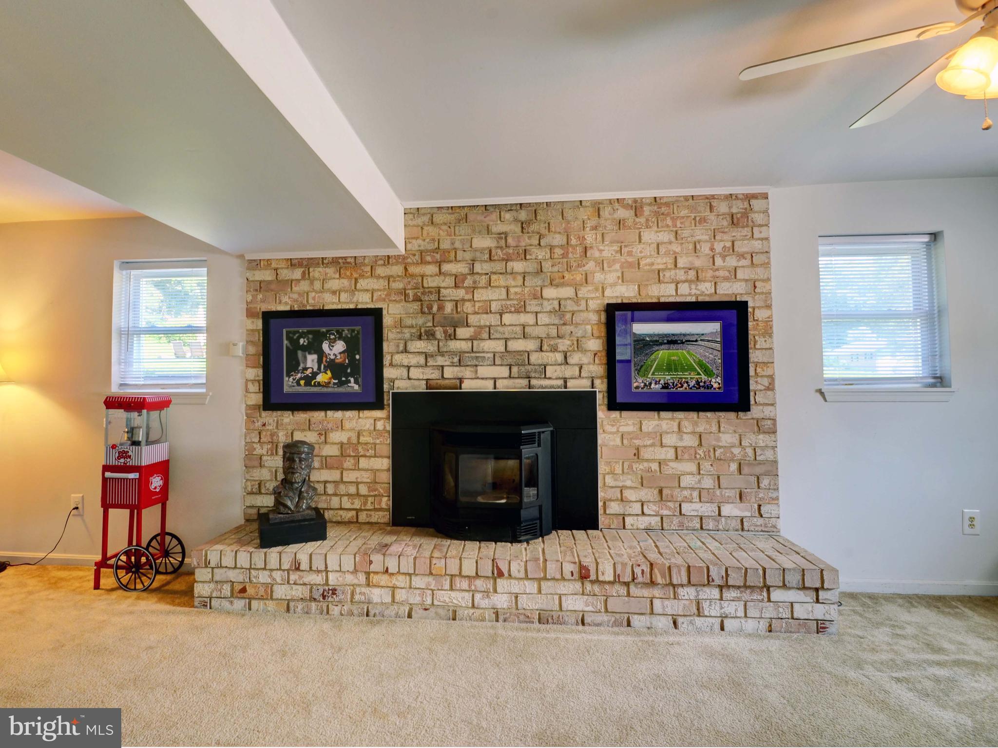 2115 Round Hill Road Fallston, MD 21047 - Photo 24 of 30 a living room with furniture and a fireplace