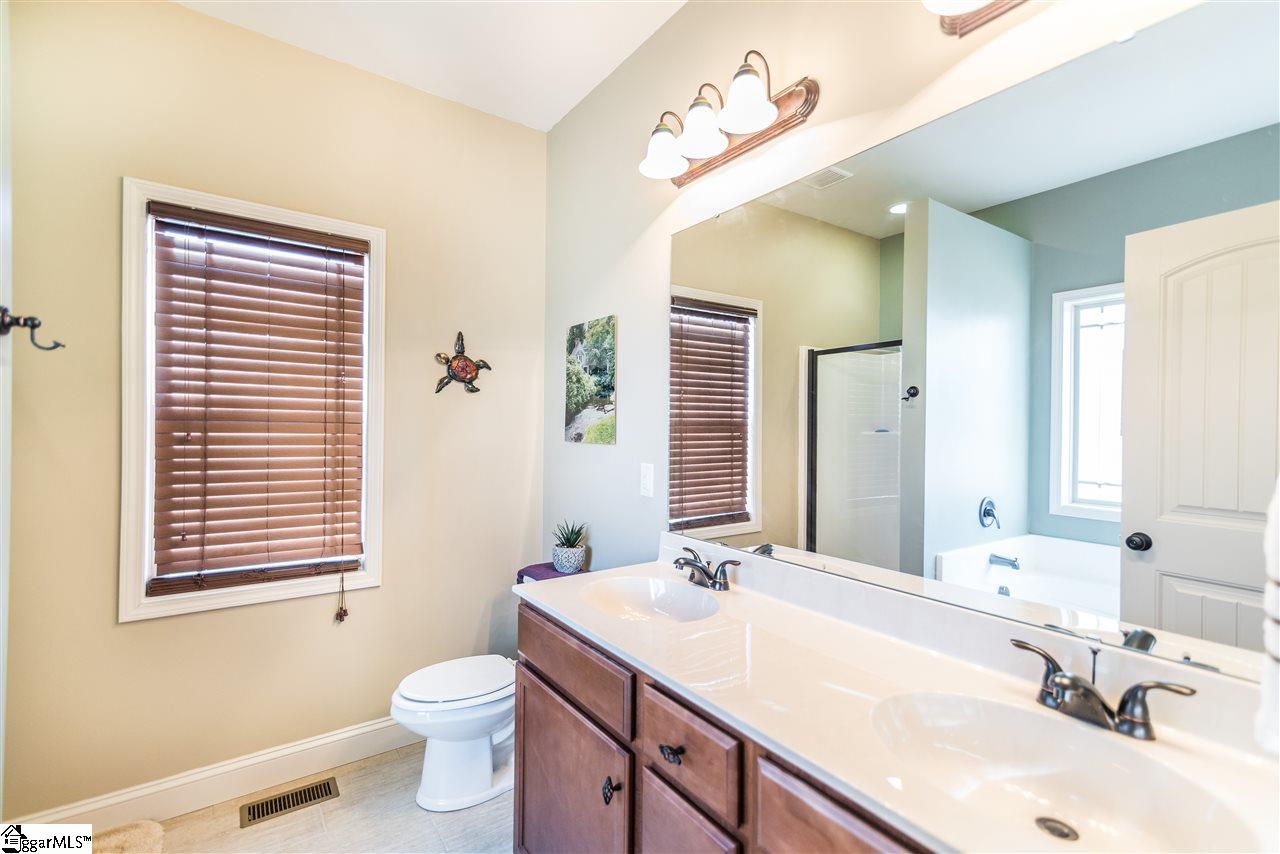 26 Caperton Way Greer, SC 29651 - Photo 12 of 23 Master Bath with double sinks, garden tub and separate shower.