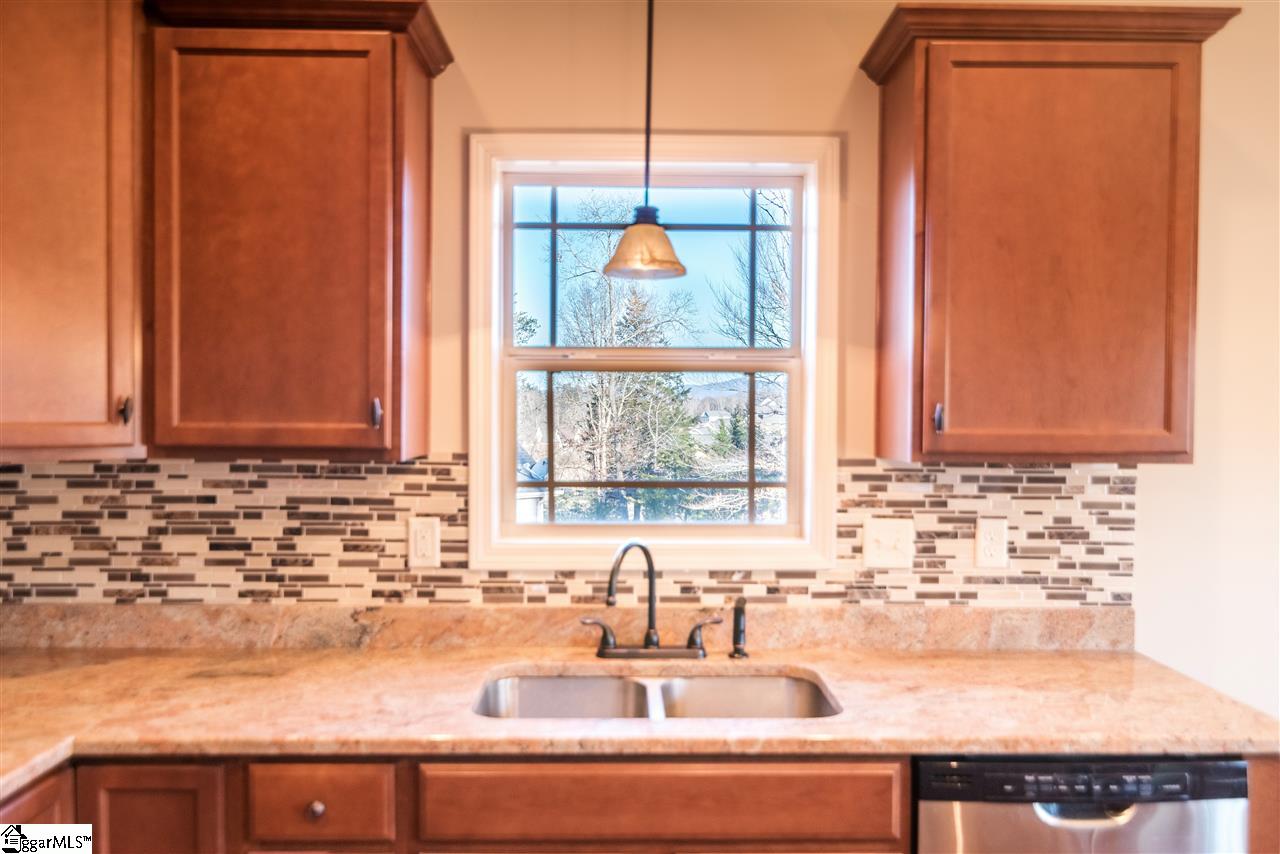 26 Caperton Way Greer, SC 29651 - Photo 6 of 23 Wash dishes overlooking the side yard and distant mountain views!