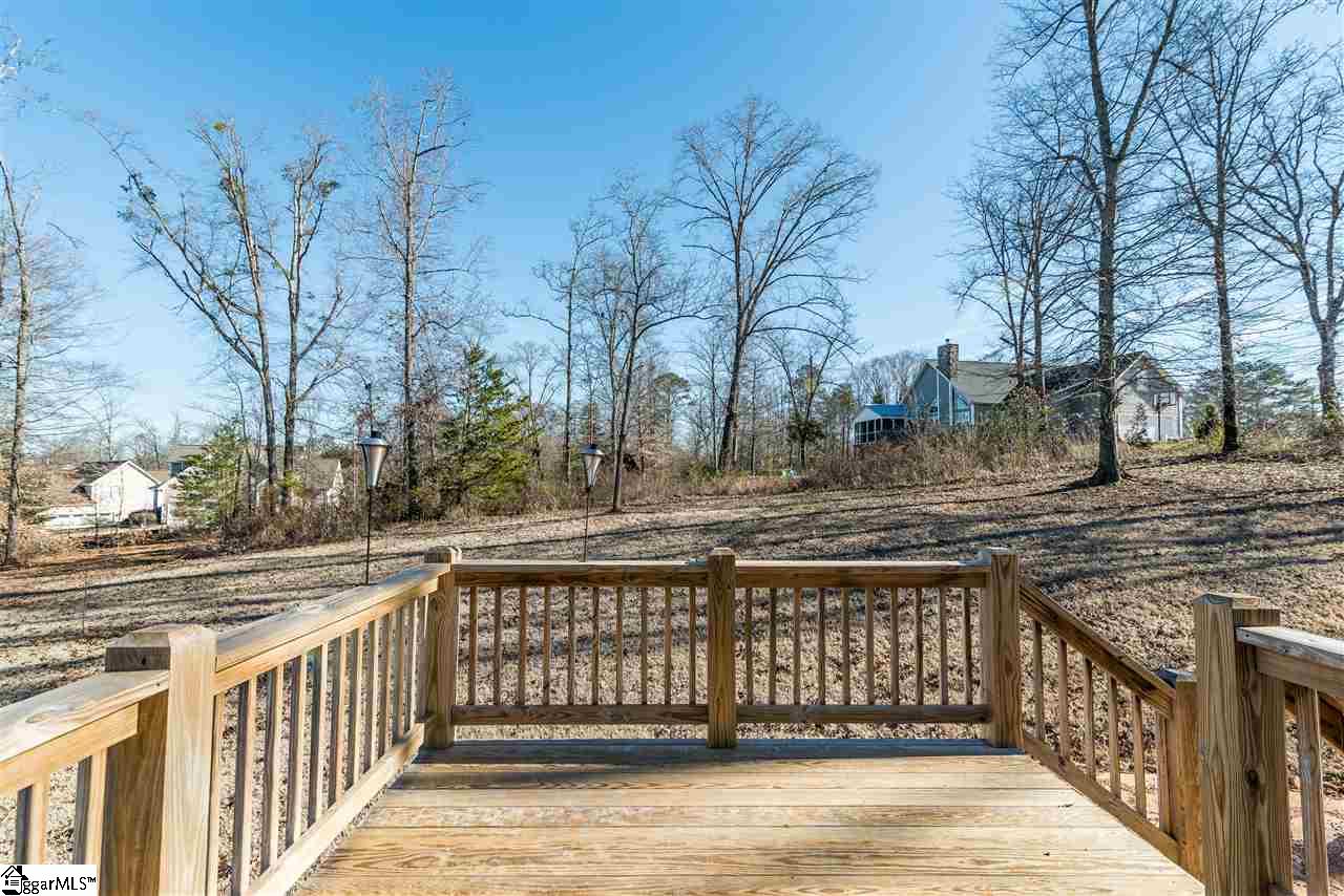 26 Caperton Way Greer, SC 29651 - Photo 8 of 23 Back deck overlooking oversized yard. Perfect for entertaining or relaxing!
