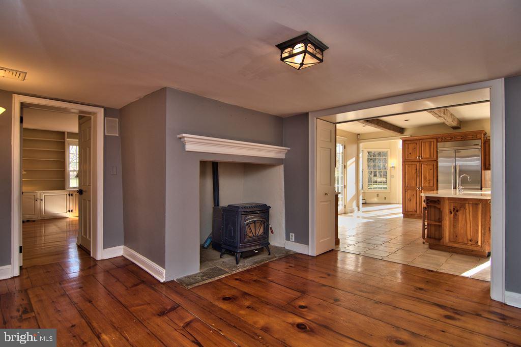 3055 Haupts Bridge Road Riegelsville, PA 18077 - Photo 11 of 65 Sitting Rm w walk-in frplc, random width pine flrs