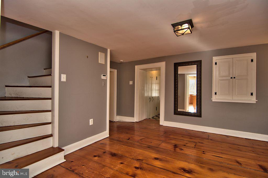 3055 Haupts Bridge Road Riegelsville, PA 18077 - Photo 13 of 65 Sitting Rm with view of pie wedge stairs