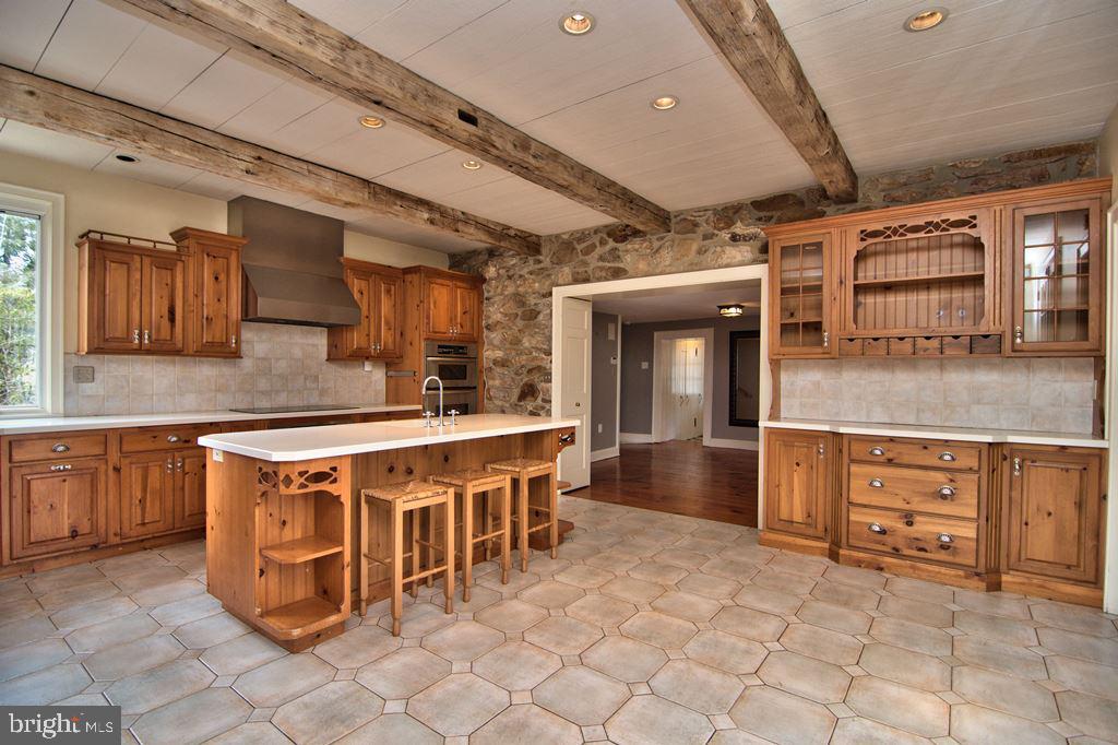 3055 Haupts Bridge Road Riegelsville, PA 18077 - Photo 17 of 65 Kitchen with view of stone wall & built-in hutch