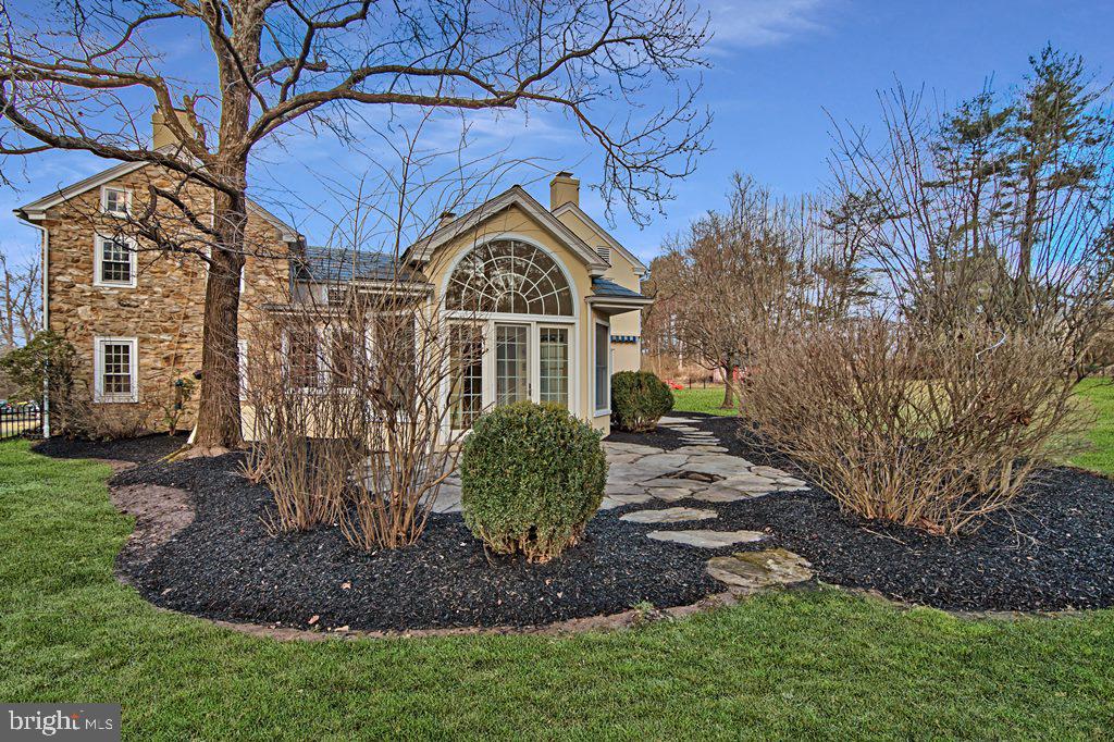 3055 Haupts Bridge Road Riegelsville, PA 18077 - Photo 3 of 65 Side exterior view with landscaping & patio