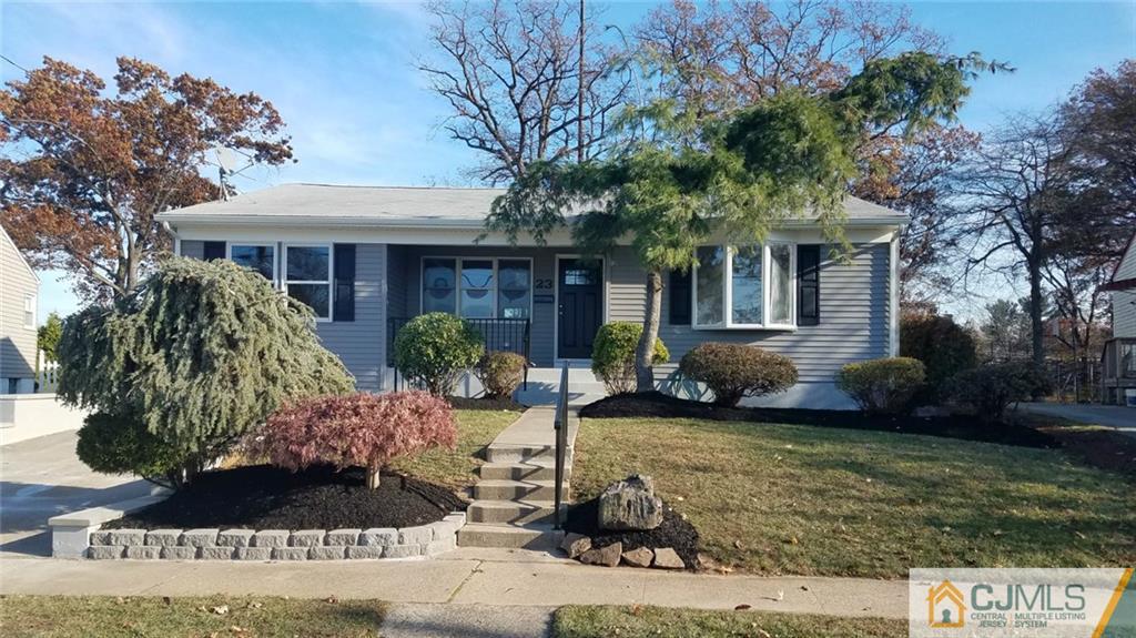 23 Ferris Road Edison, NJ 08817 - Photo 1 of 21 a front view of a house with garden