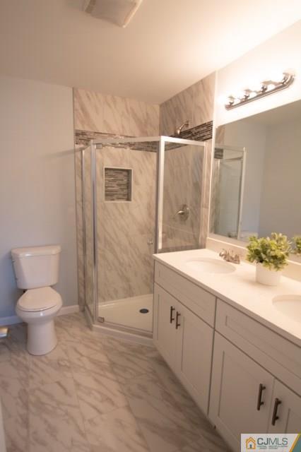 23 Ferris Road Edison, NJ 08817 - Photo 14 of 21 a bathroom with a sink a toilet and shower