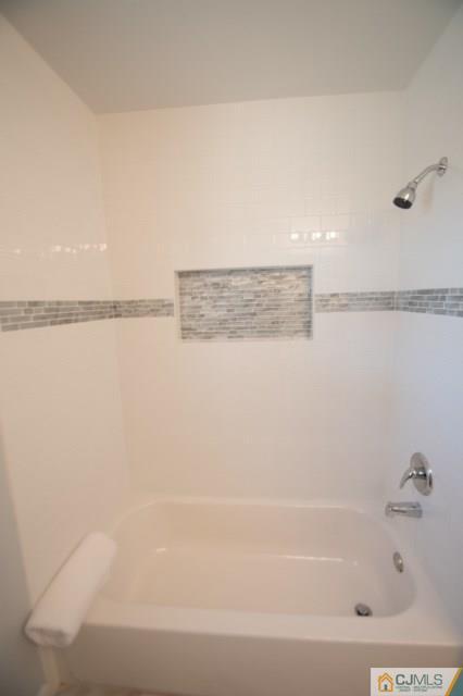 23 Ferris Road Edison, NJ 08817 - Photo 16 of 21 a bathroom with a shower and a shower