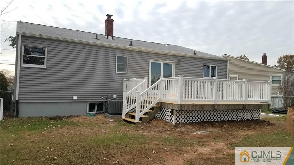 23 Ferris Road Edison, NJ 08817 - Photo 21 of 21 a front view of a house with a yard