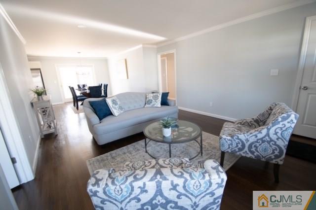 23 Ferris Road Edison, NJ 08817 - Photo 4 of 21 a living room with furniture and wooden floor