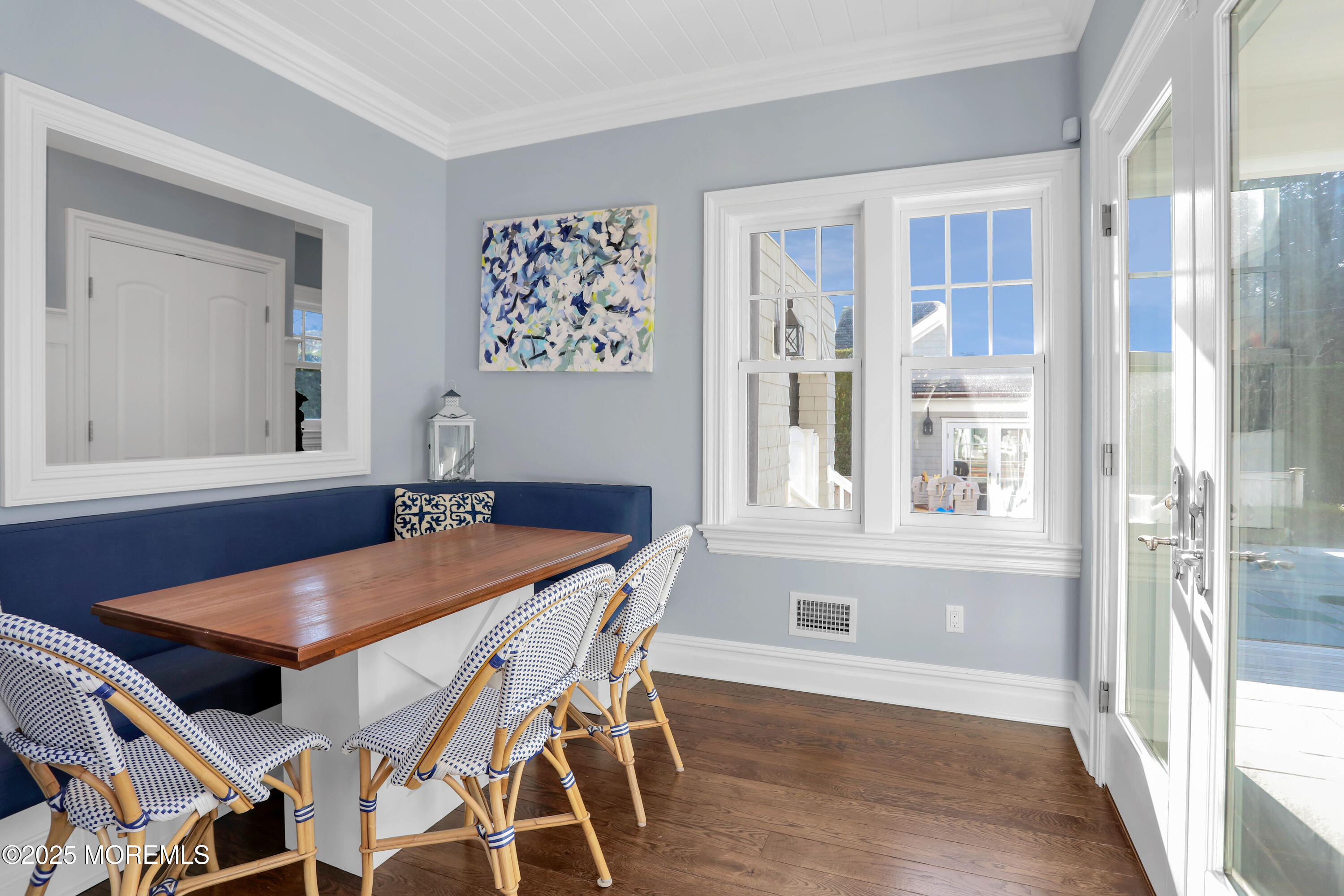 101 Tuttle Avenue Spring Lake, NJ 07762 - Photo 16 of 58 a view of a dining room with furniture and wooden floor