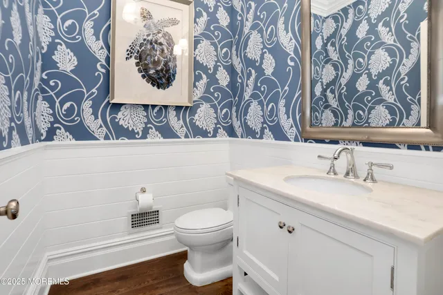 a view of a bathroom from a hallway