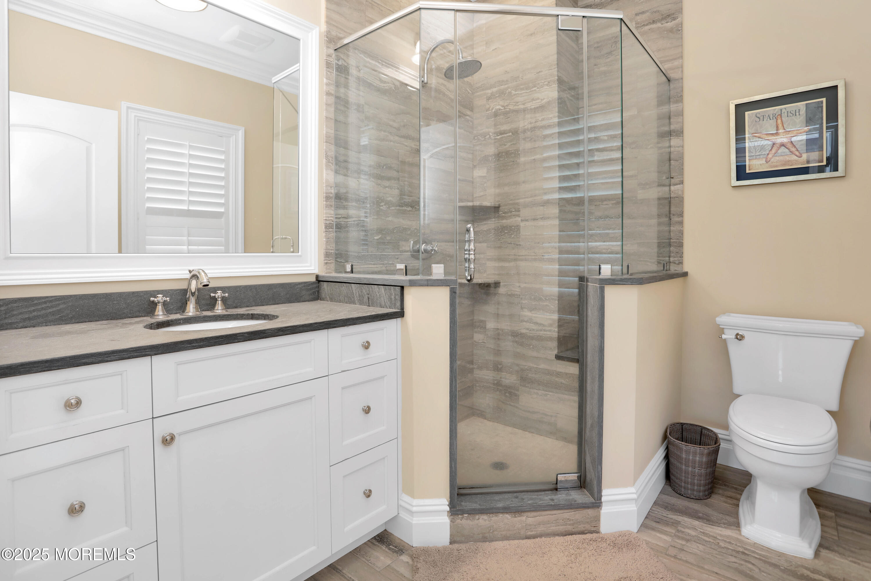 101 Tuttle Avenue Spring Lake, NJ 07762 - Photo 23 of 58 a bathroom with a granite countertop sink toilet and shower
