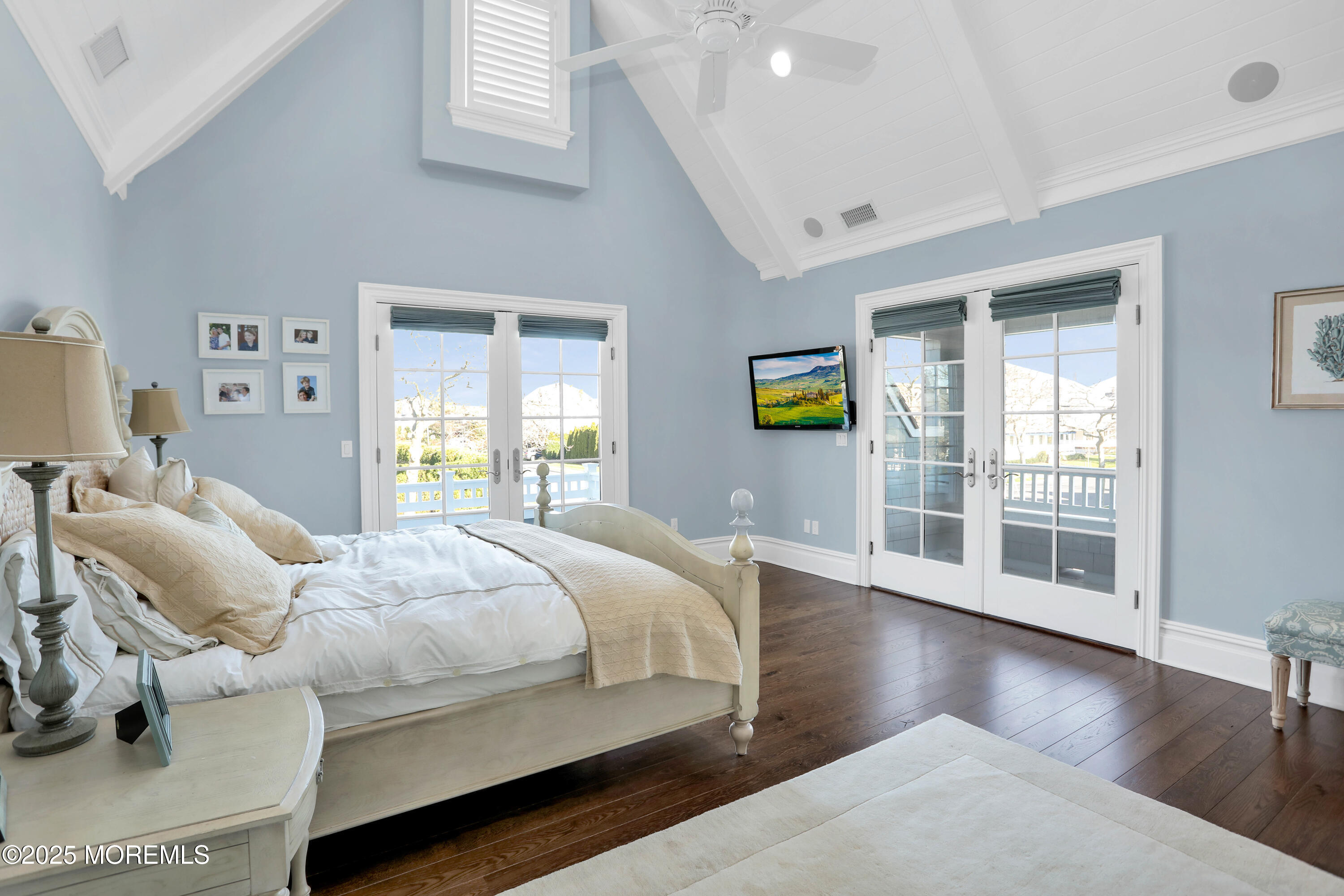 101 Tuttle Avenue Spring Lake, NJ 07762 - Photo 24 of 58 a bedroom with a bed and wooden floor