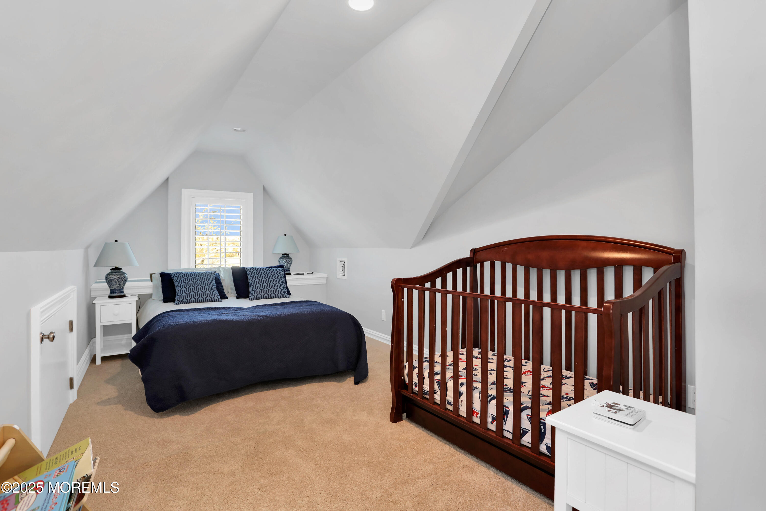 101 Tuttle Avenue Spring Lake, NJ 07762 - Photo 42 of 58 a bedroom with a bed and a dresser