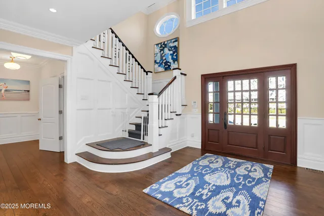 a living room with a bath tub and a rug