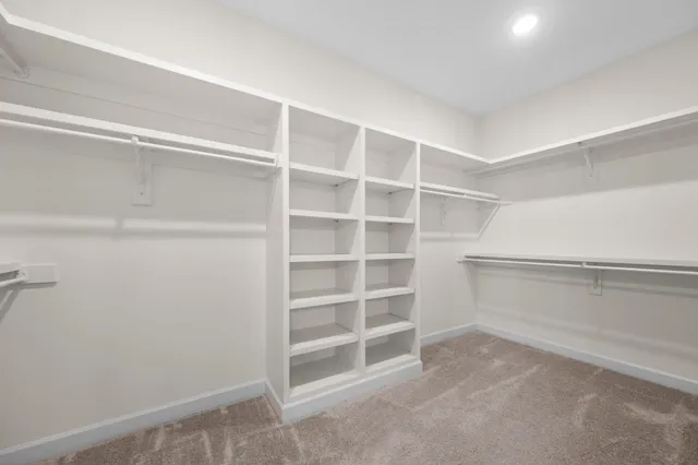 a bathroom with a granite countertop sink a toilet and bathtub