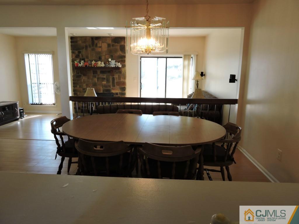 606 Timber Oaks Road Edison, NJ 08820 - Photo 3 of 14 a dining room with furniture and window