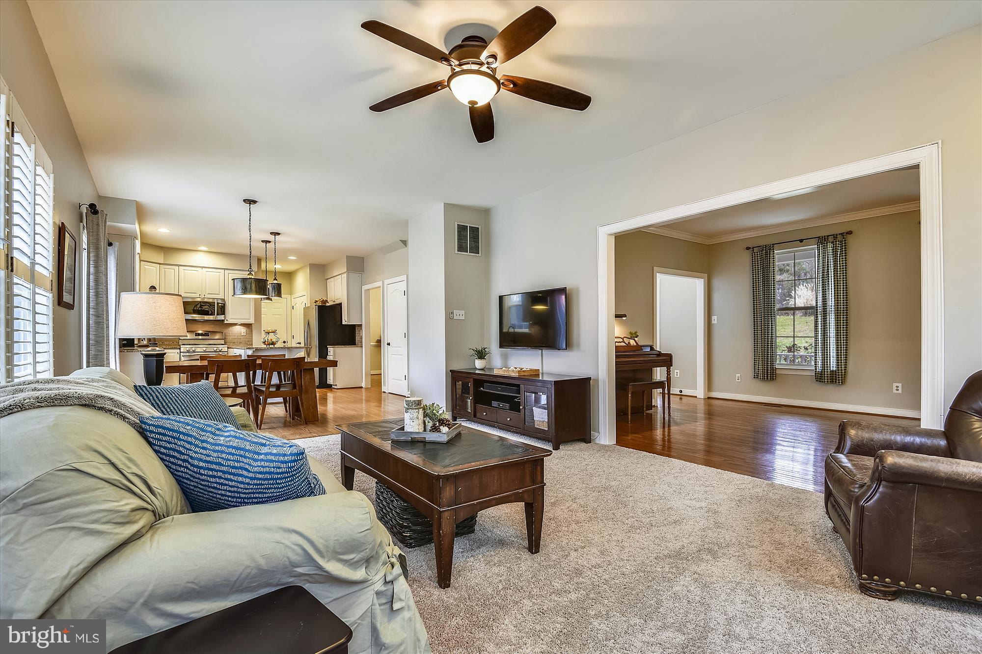 484 Stratford Road Fallston, MD 21047 - Photo 15 of 44 a living room with furniture ceiling fan and a wooden floor