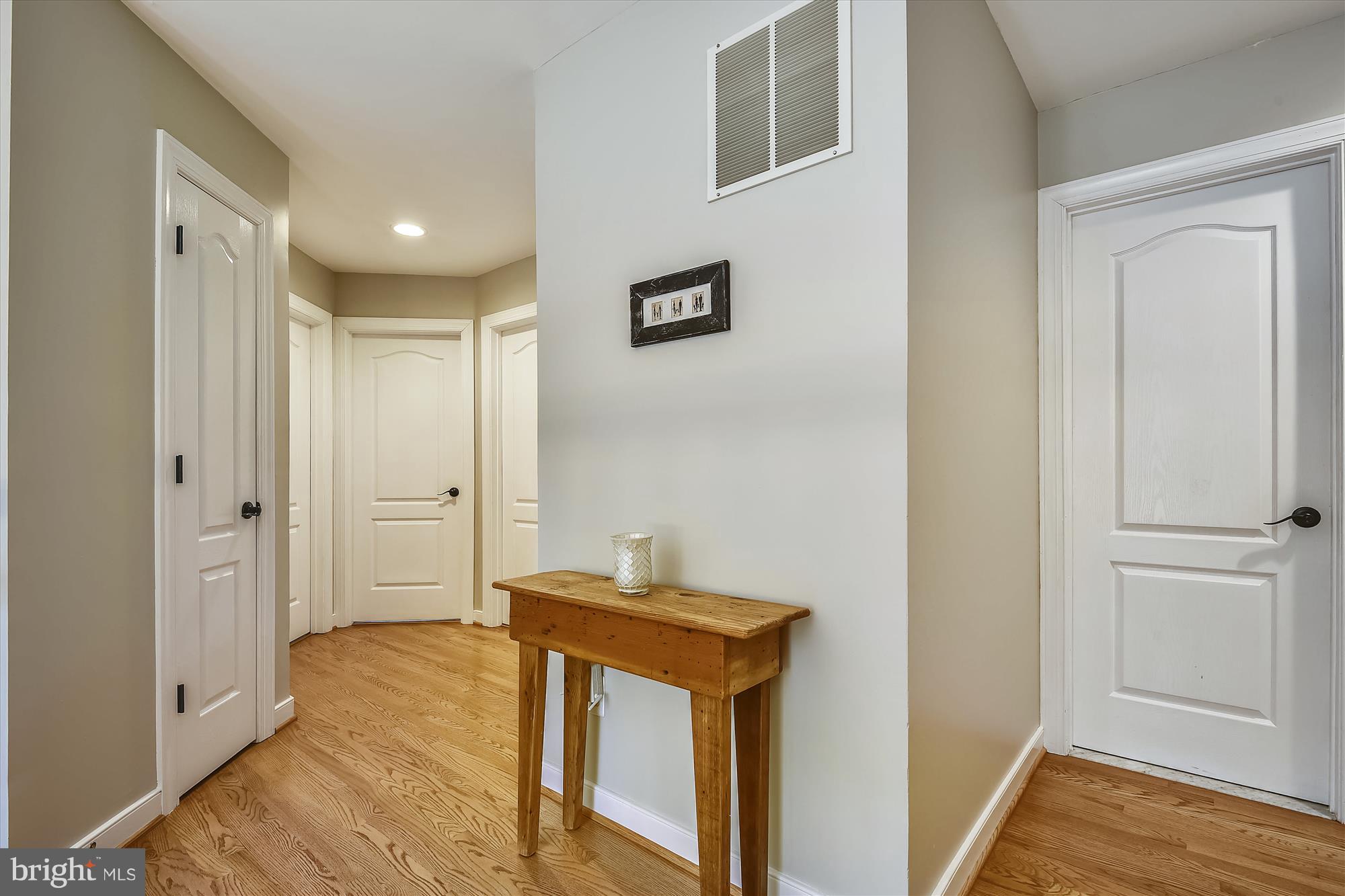 484 Stratford Road Fallston, MD 21047 - Photo 20 of 44 a view of a hallway with wooden floor and cabinet