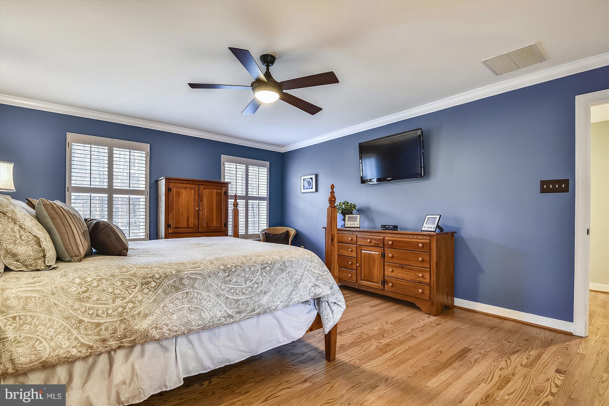 484 Stratford Road Fallston, MD 21047 - Photo 22 of 44 a bedroom with a large bed and a flat screen tv