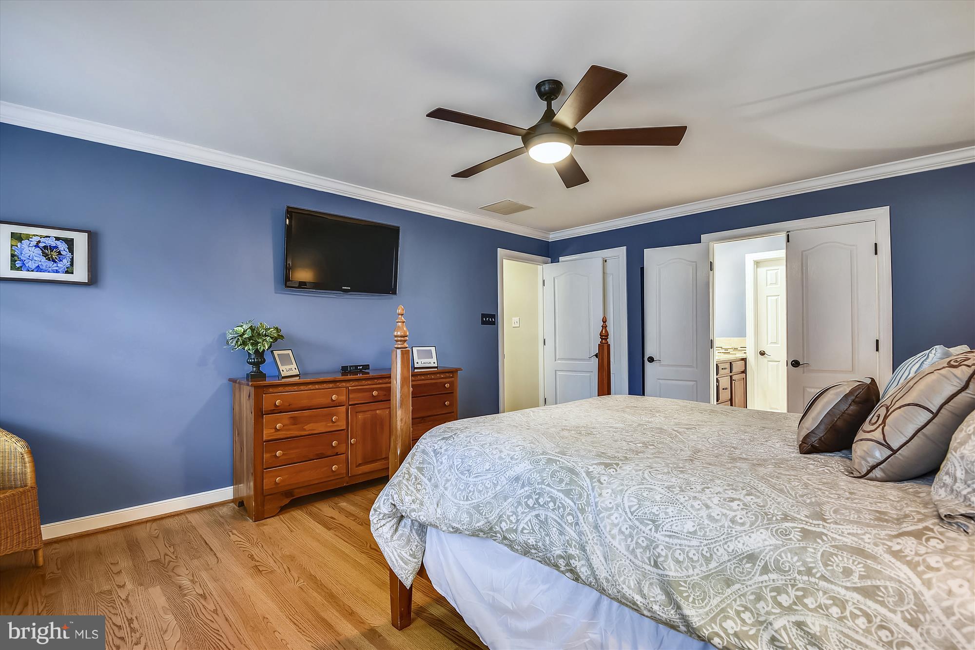 484 Stratford Road Fallston, MD 21047 - Photo 23 of 44 a bedroom with a bed and a flat screen tv