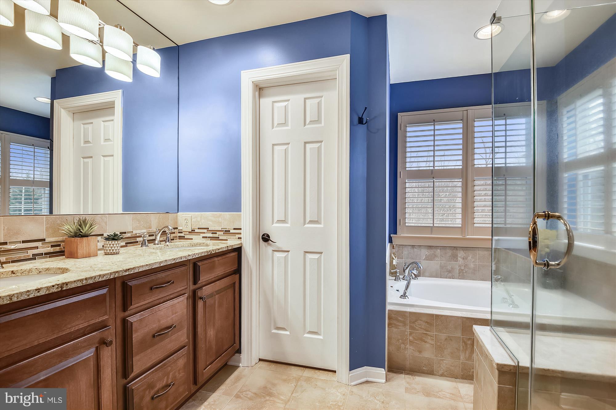 484 Stratford Road Fallston, MD 21047 - Photo 25 of 44 a bathroom with a sink and a mirror