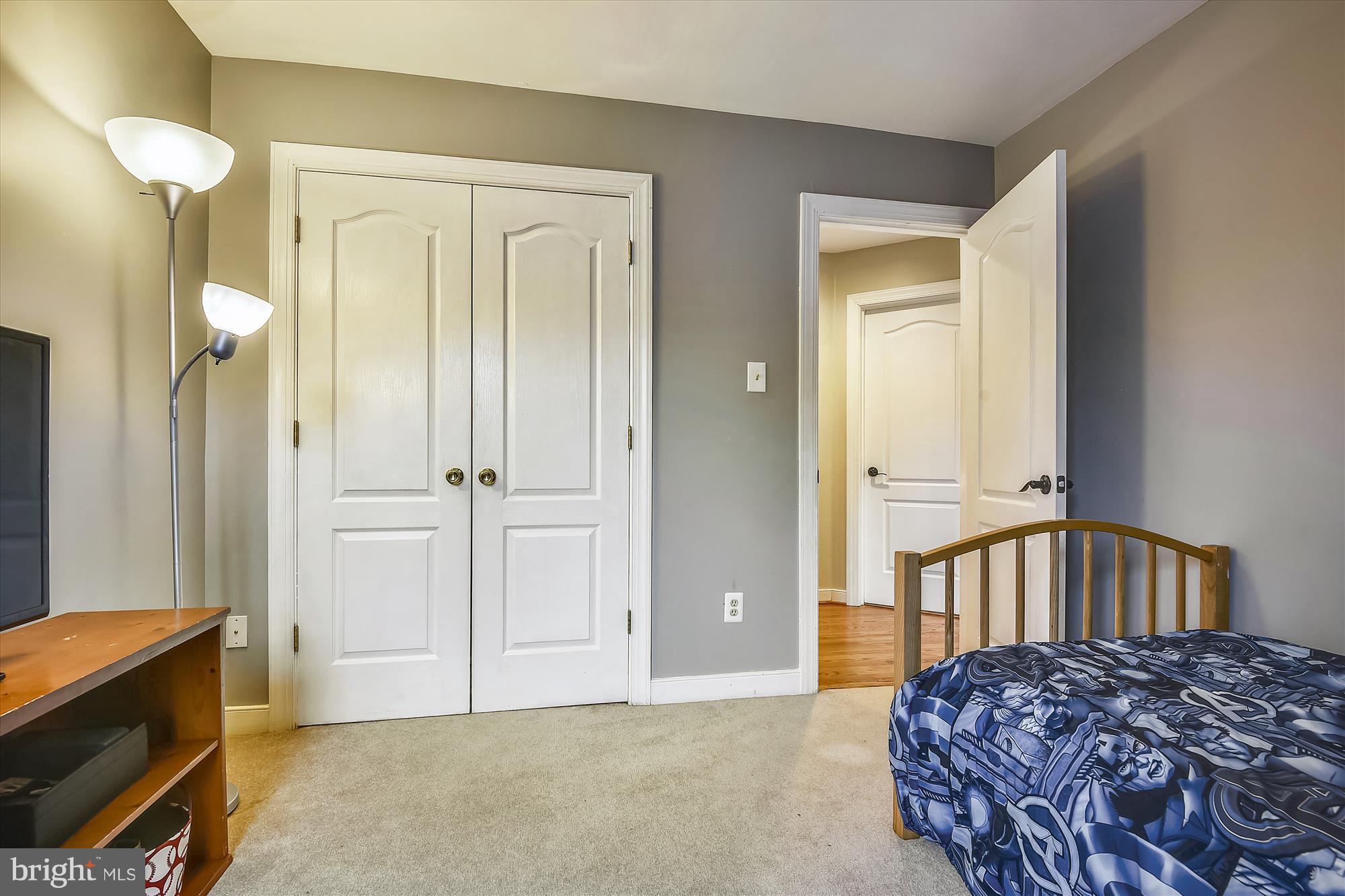 484 Stratford Road Fallston, MD 21047 - Photo 31 of 44 a bedroom with a bed and wooden floor