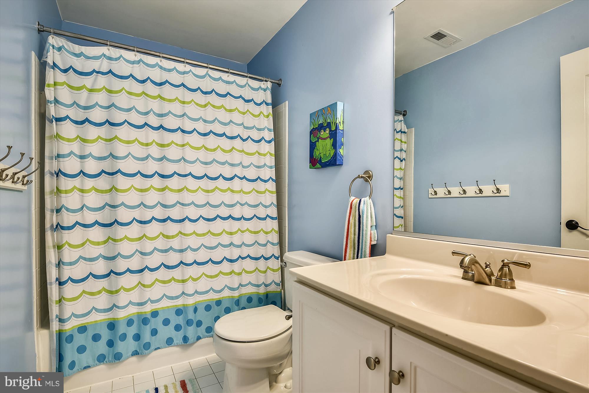 484 Stratford Road Fallston, MD 21047 - Photo 33 of 44 a bathroom with a sink and a mirror
