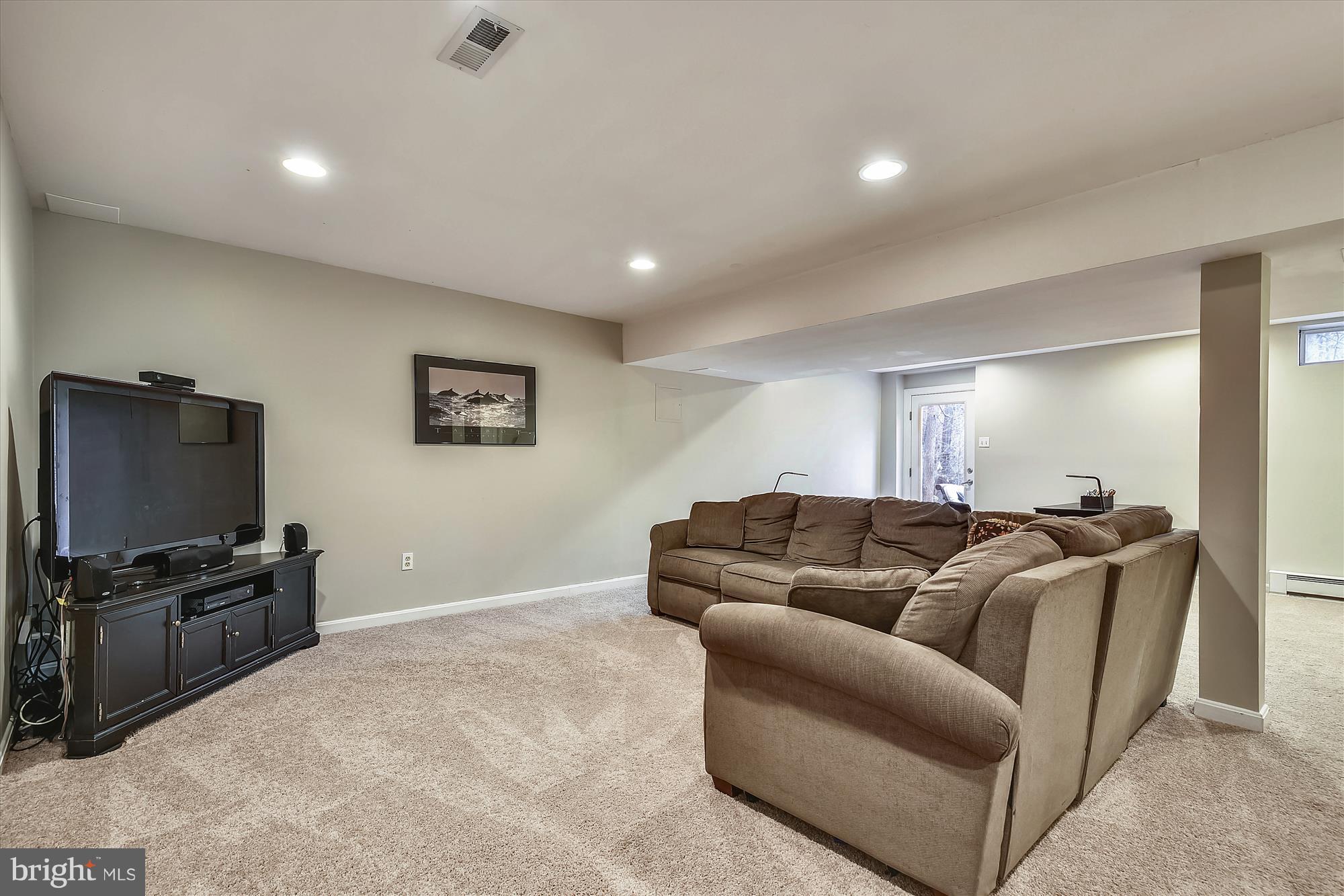 484 Stratford Road Fallston, MD 21047 - Photo 34 of 44 a living room with furniture and a flat screen tv