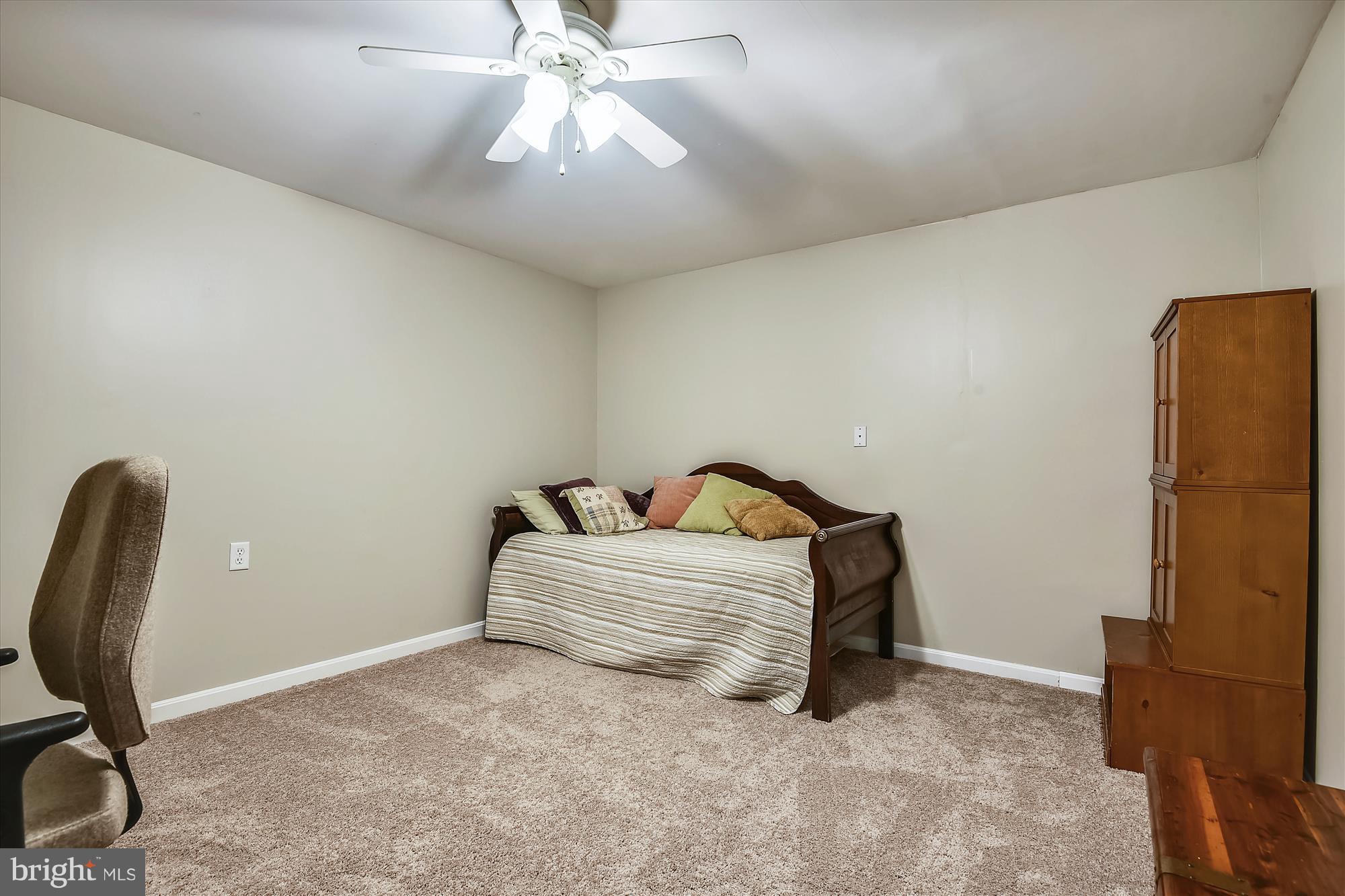 484 Stratford Road Fallston, MD 21047 - Photo 37 of 44 a bedroom with a bed and a chandelier