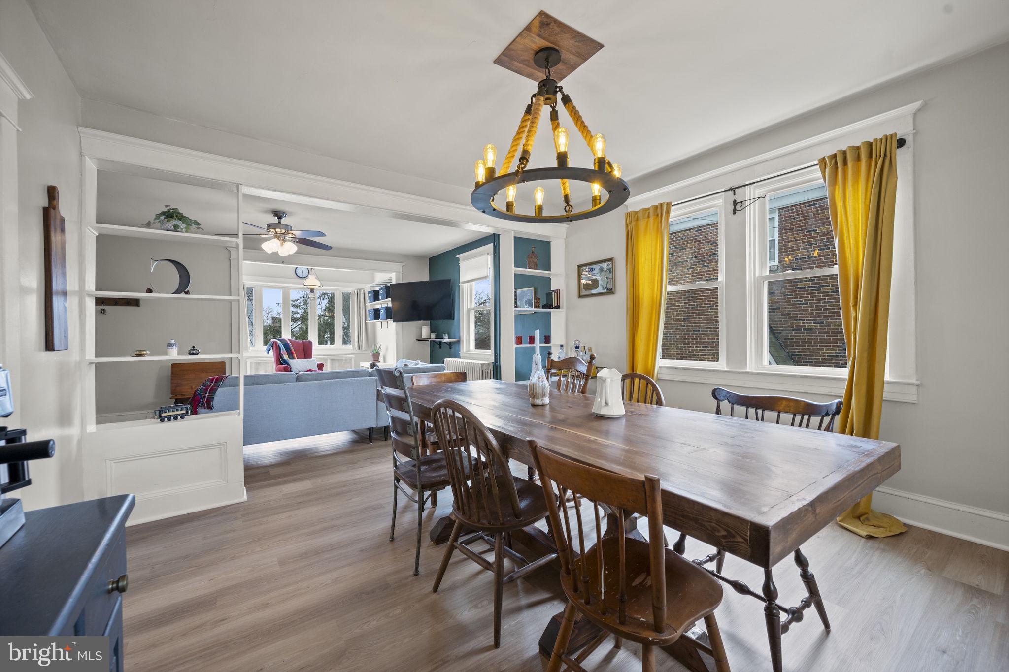 4 Elinor Avenue Baltimore, MD 21236 - Photo 11 of 47 a view of a dining room with furniture window and wooden floor